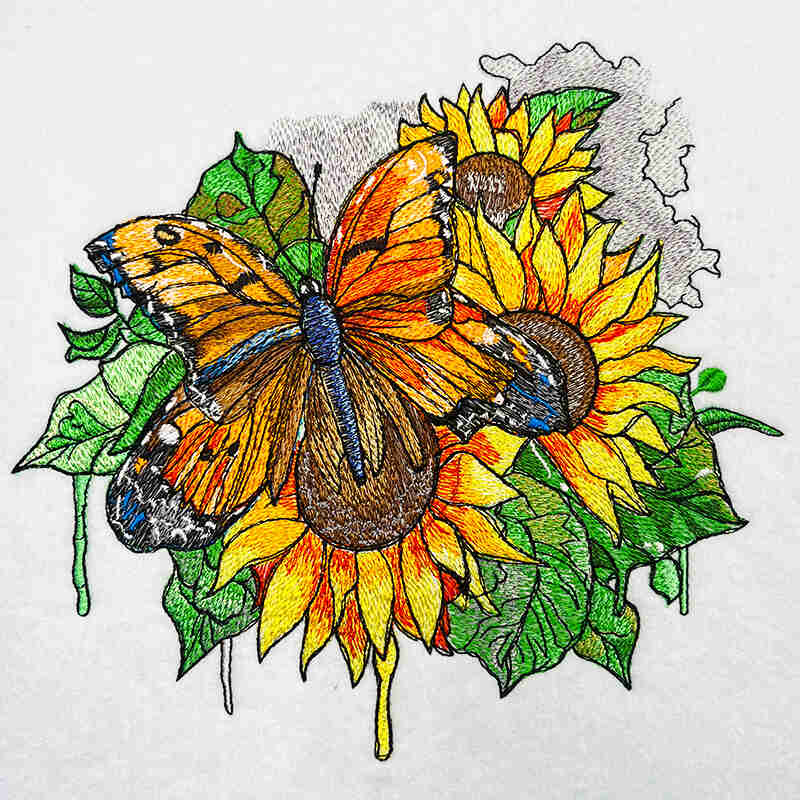 An embroidered tote handbag featuring a sunflower and butterfly design on a jute fabric.