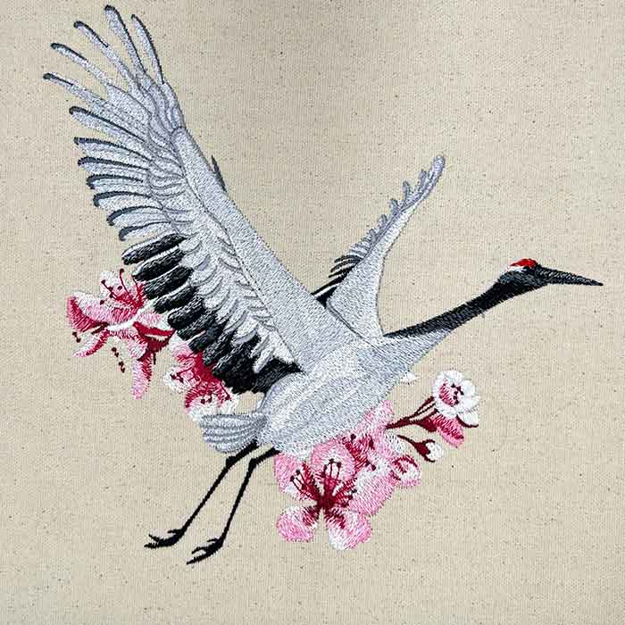 Crane Cherry Blossoms Machine Embroidered Jute Tote – Hand Finished in Dubai | EmbroMania