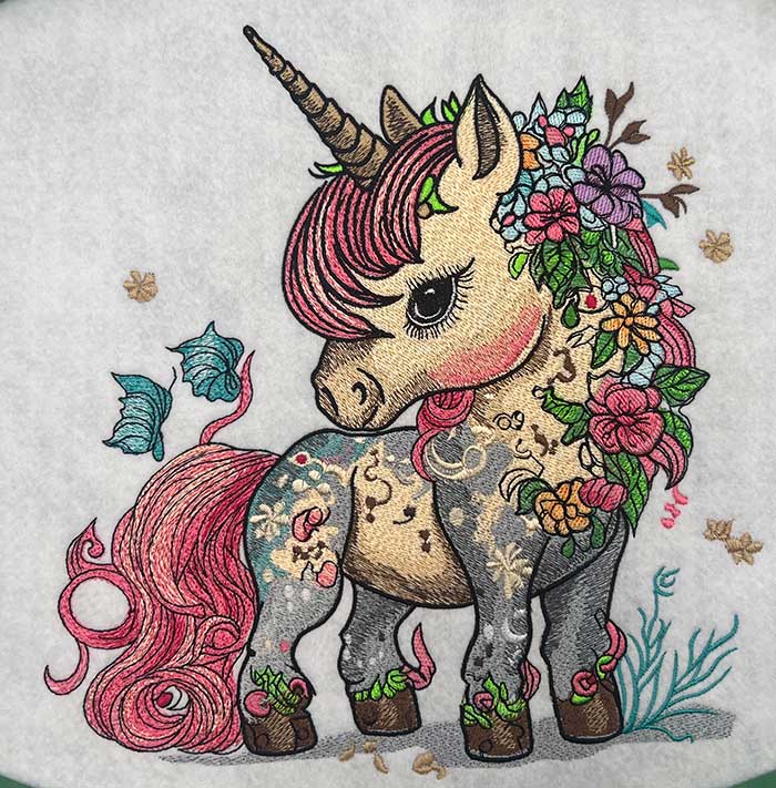 Enchanted Floral Unicorn – Machine Embroidered Denim Hoodie Jacket | Hand Finished in Dubai
