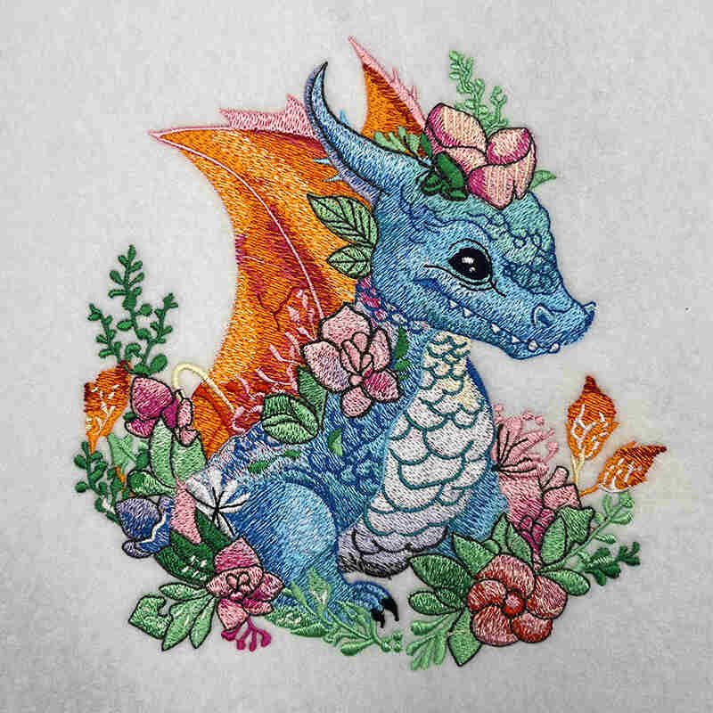 Baby Blue Dragon Machine Embroidered Sweatshirt – Hand Finished in Dubai | EmbroMania