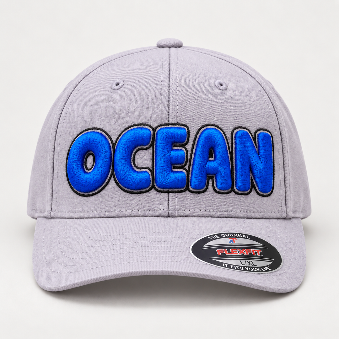 🔵⚫ Deep Ocean – Bubble Pop 3D Puff · Royal Blue fill · Black outline · Light Grey Flexfit | Hand Finished in Dubai | EmbroMania