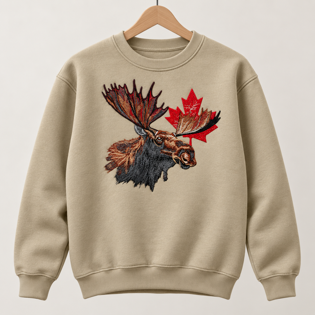 Canadian Moose Crest Machine Embroidered Sweatshirt in Medium White – Bull moose and maple leaf design embroidered on white 320gsm cotton fleece crewneck | Hand Finished in Dubai