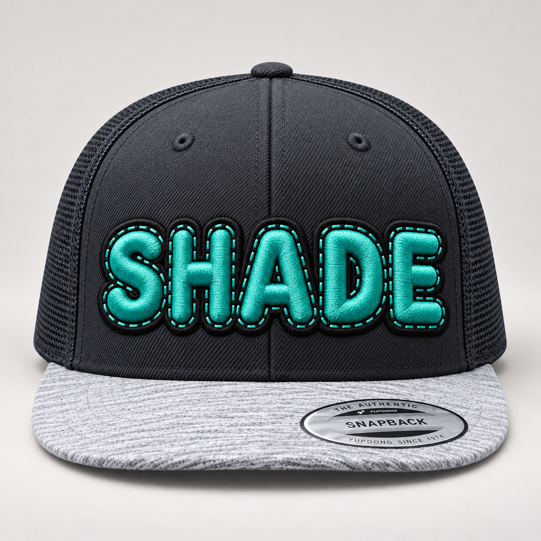 👻 Phantom Pop – DoubleLayer Pop · Teal letter · Black border · Charcoal Heather Snapback | Hand Finished in Dubai | EmbroMania