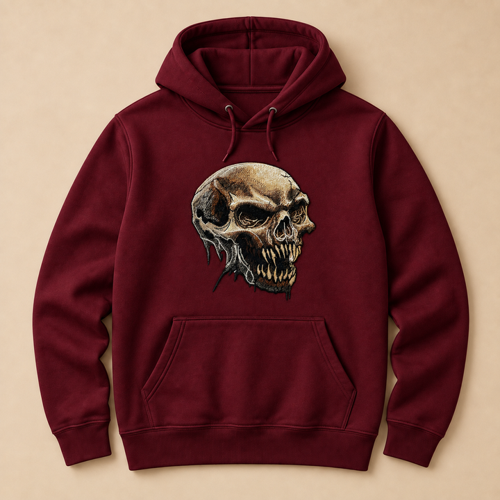 Feral Bonefang Skull Machine Embroidered Hoodie in Large Burgundy – Bone-toned fanged skull design embroidered on burgundy 320gsm premium fleece | Hand Finished in Dubai