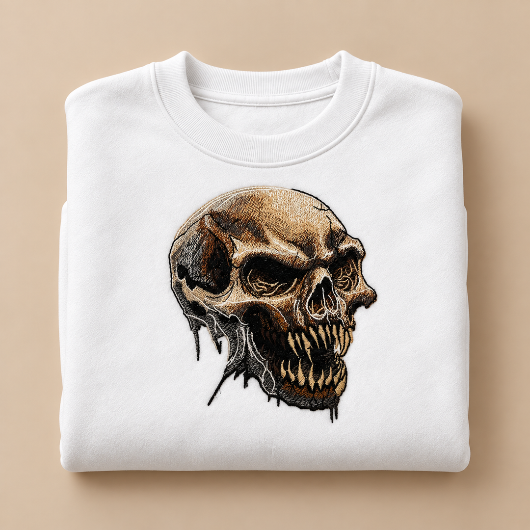 Feral Bonefang Skull Machine Embroidered Sweatshirt in Large Mint Green – Bone-toned fanged skull design embroidered on mint green 320gsm cotton fleece crewneck | Hand Finished in Dubai