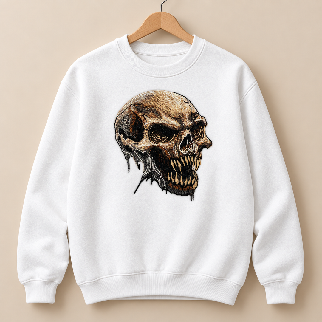 Feral Bonefang Skull Machine Embroidered Sweatshirt in Medium Mint Green – Bone-toned fanged skull design embroidered on mint green 320gsm cotton fleece crewneck | Hand Finished in Dubai