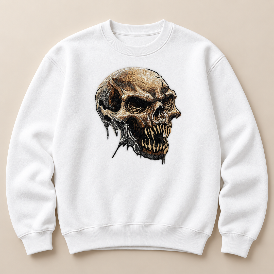 Feral Bonefang Skull Machine Embroidered Sweatshirt in Small Mint Green – Bone-toned fanged skull design embroidered on mint green 320gsm cotton fleece crewneck | Hand Finished in Dubai