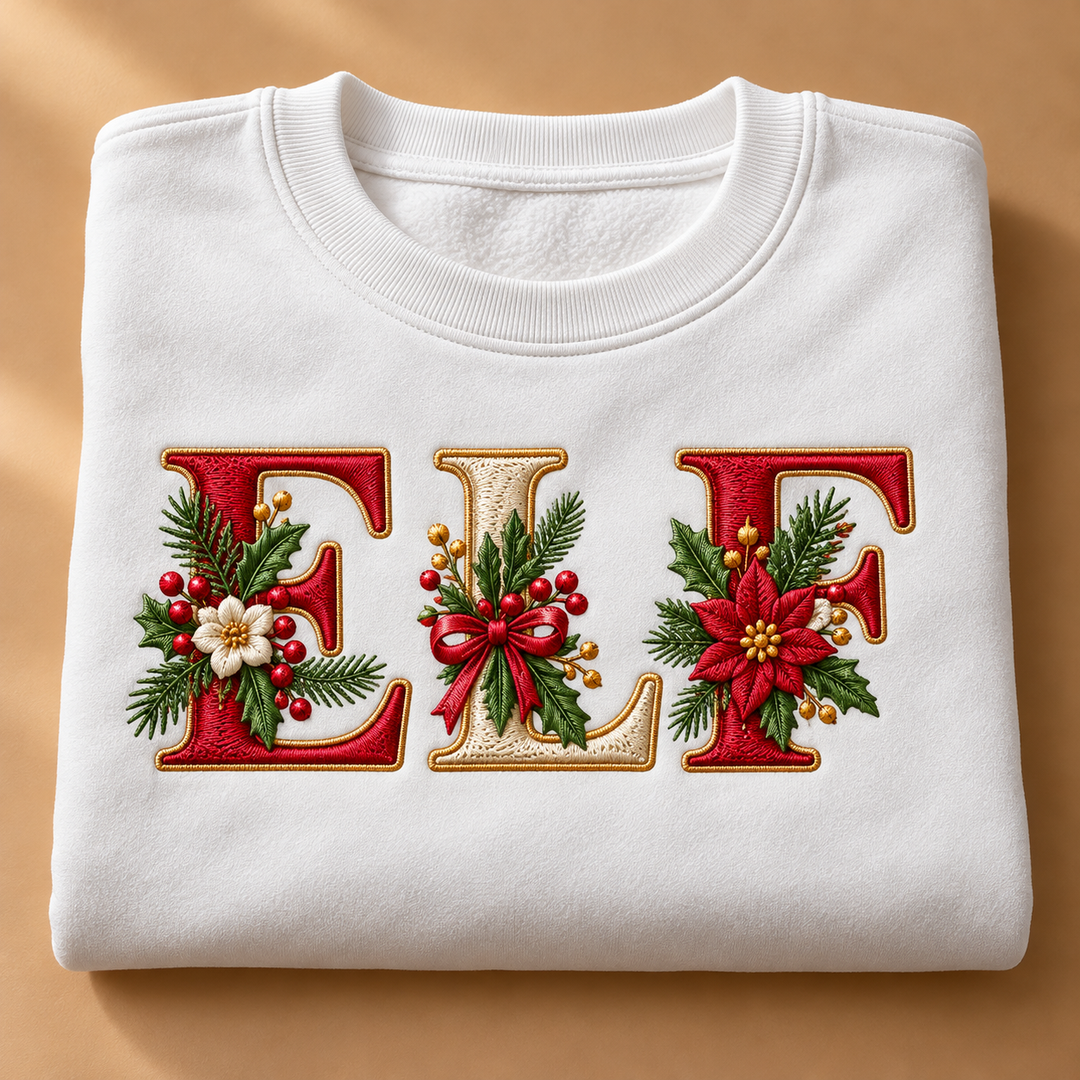 Festive Poinsettia Alphabet custom lettering "ELF" machine embroidered on a white sweatshirt – red and cream serif letters with gold outline, poinsettias, holly and berries | Hand Finished in Dubai | EmbroMania
