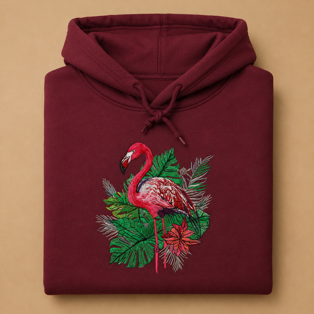 Flamingo Botanica Machine Embroidered Hoodie in Small Fuchsia – Botanical flamingo design with tropical blooms embroidered on fuchsia 320gsm premium fleece | Hand Finished in Dubai