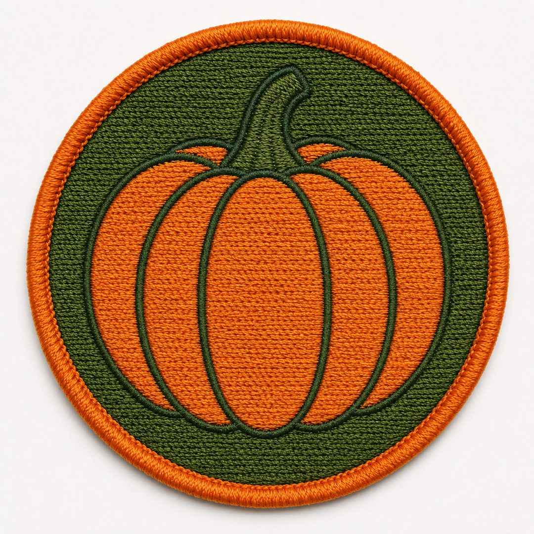 Golden Pumpkin Patch embroidery patch featuring a pumpkin silhouette with a curled stem in warm orange and green | Hand Finished in Dubai | EmbroMania