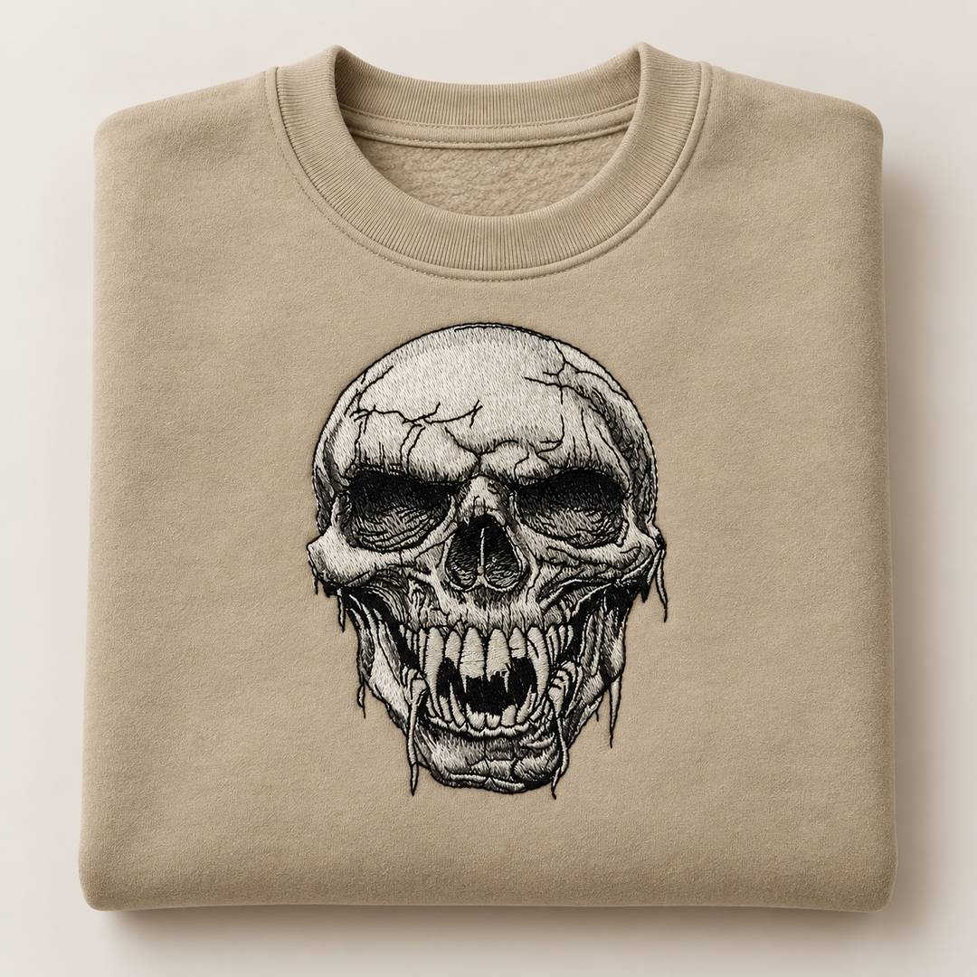 Hollow Fang Skull Machine Embroidered Sweatshirt in Large White – Monochrome fanged skull design embroidered on white 320gsm cotton fleece crewneck | Hand Finished in Dubai