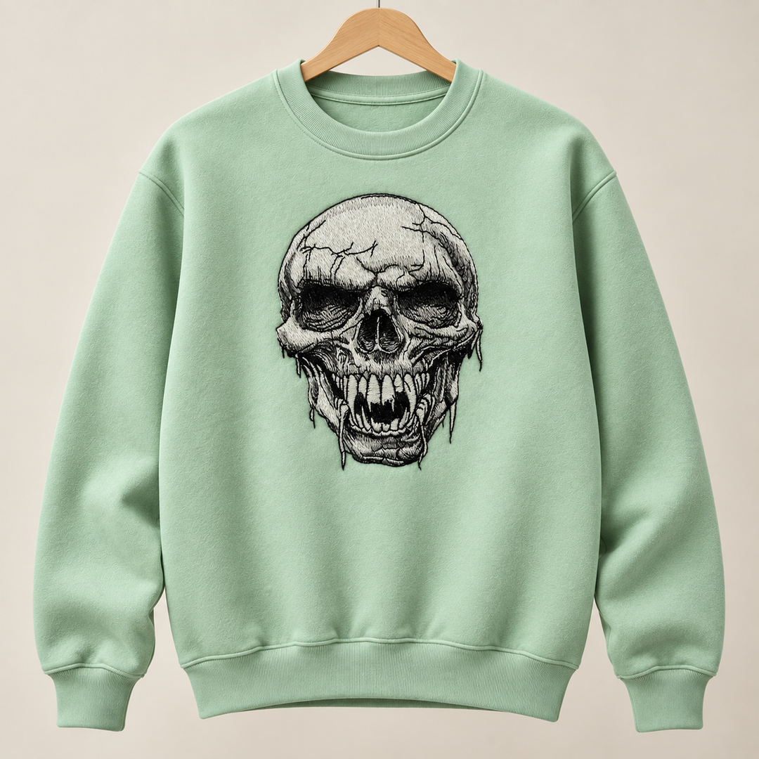 Hollow Fang Skull Machine Embroidered Sweatshirt in Medium Khaki – Monochrome fanged skull design embroidered on khaki 320gsm cotton fleece crewneck | Hand Finished in Dubai