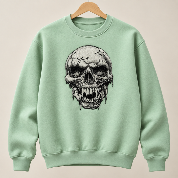 Hollow Fang Skull Machine Embroidered Sweatshirt in Medium Khaki – Monochrome fanged skull design embroidered on khaki 320gsm cotton fleece crewneck | Hand Finished in Dubai