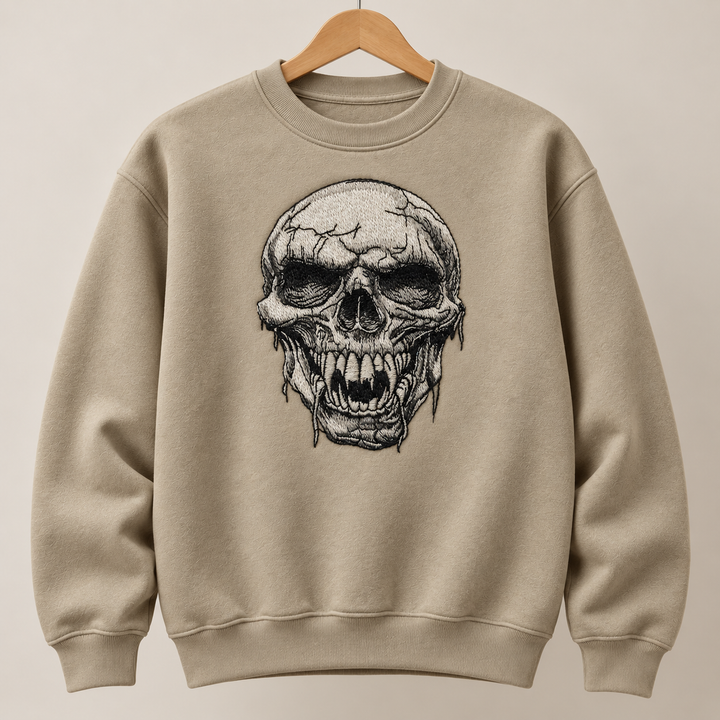 Hollow Fang Skull Machine Embroidered Sweatshirt in Medium White – Monochrome fanged skull design embroidered on white 320gsm cotton fleece crewneck | Hand Finished in Dubai