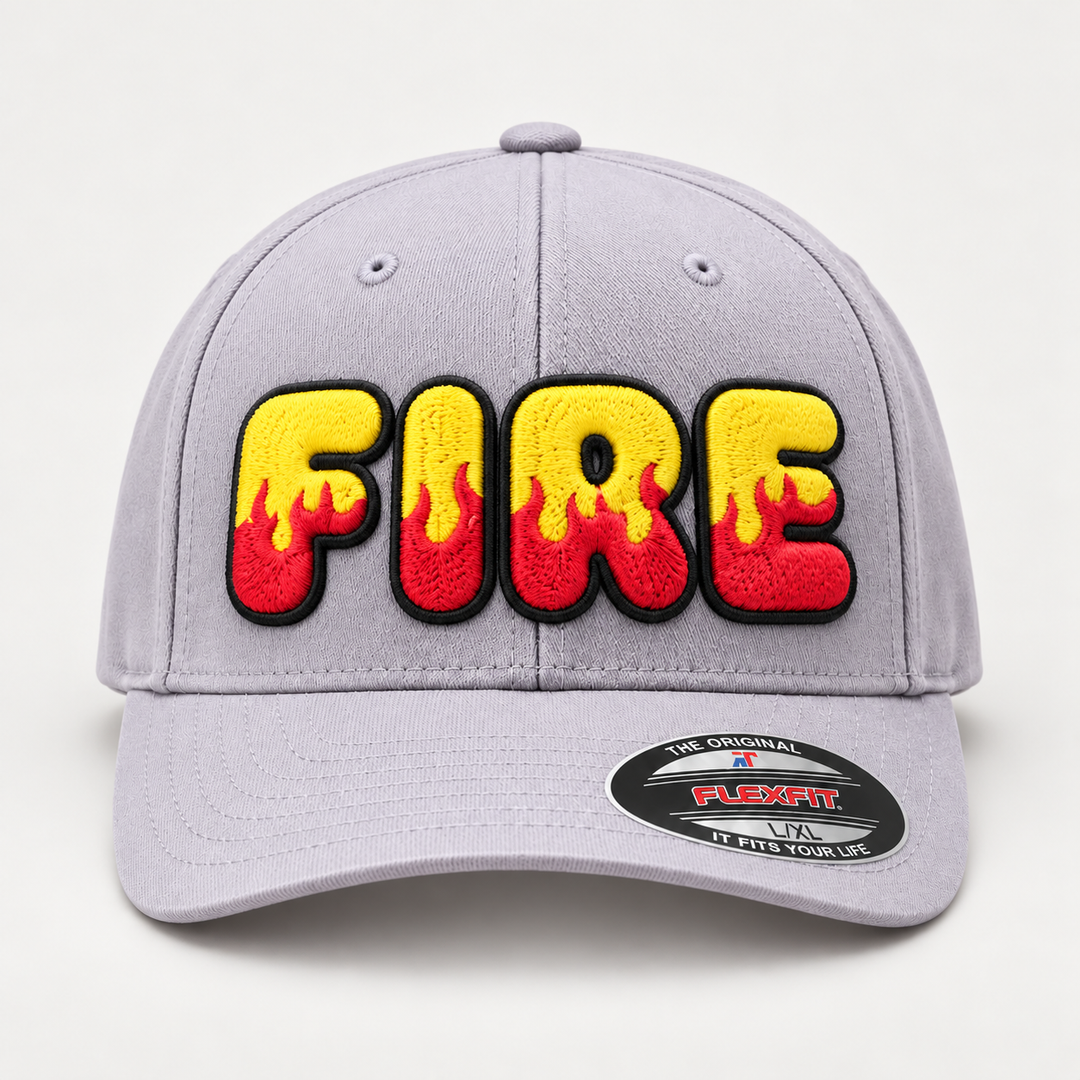 🔥🟡 Inferno Classic – Inferno Pop Custom Cap Font · Yellow fill · Red flame · Black outline · Light Grey Flexfit | Hand Finished in Dubai | EmbroMania