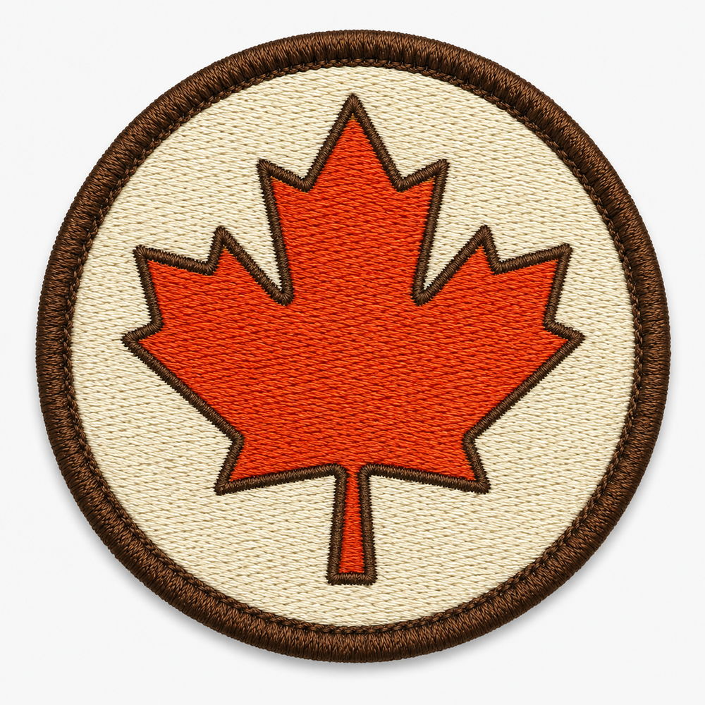 Maple Ember Leaf embroidery patch featuring a maple leaf silhouette in warm autumn red-orange tones | Hand Finished in Dubai | EmbroMania