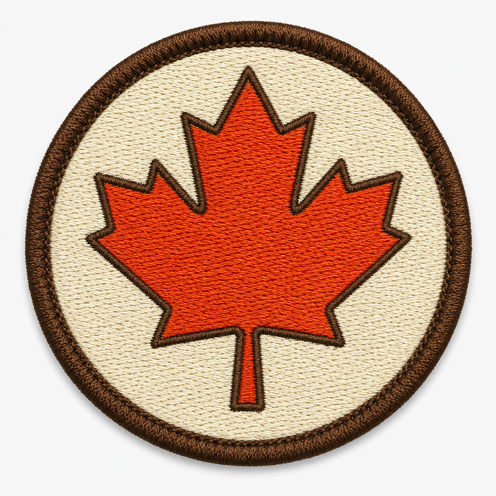 Maple Ember Leaf embroidery patch featuring a maple leaf silhouette in warm autumn red-orange tones | Hand Finished in Dubai | EmbroMania