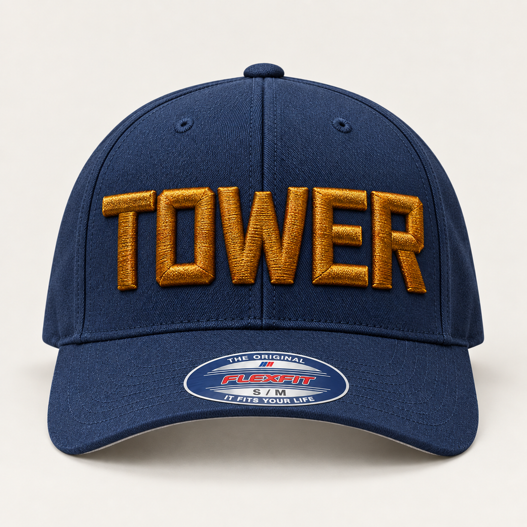 🏆 Gold Tower – Metro Block 3D Puff · Burnished Gold thread · Navy Flexfit Curved | Hand Finished in Dubai | EmbroMania