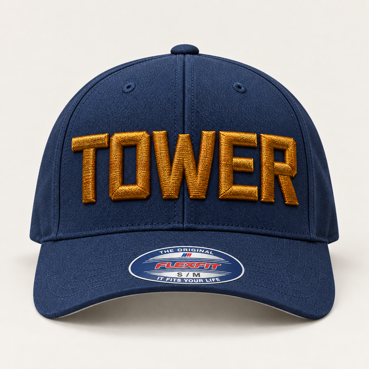 🏆 Gold Tower – Metro Block 3D Puff · Burnished Gold thread · Navy Flexfit Curved | Hand Finished in Dubai | EmbroMania