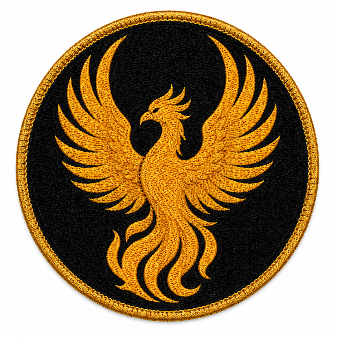 Rising Phoenix embroidery patch featuring a phoenix bird rising with wings spread over flat red-orange flames | Hand Finished in Dubai | EmbroMania