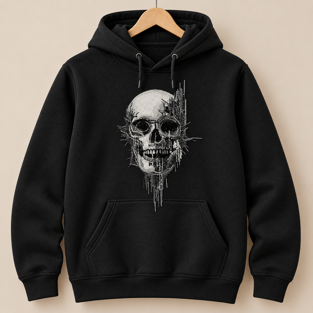 Static Fracture Skull Machine Embroidered Hoodie in Medium Black – Glitch-effect fractured skull design embroidered on black 320gsm premium fleece | Hand Finished in Dubai