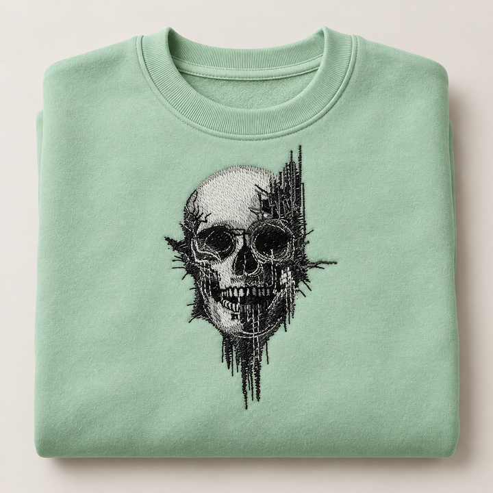Static Fracture Skull Machine Embroidered Sweatshirt in Large Khaki – Glitch-effect fractured skull design embroidered on khaki 320gsm cotton fleece crewneck | Hand Finished in Dubai