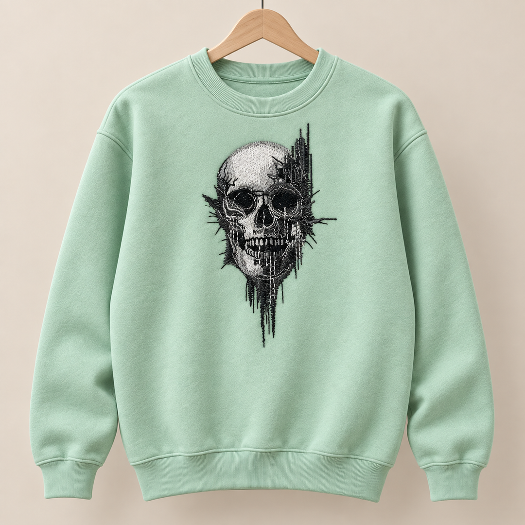 Static Fracture Skull Machine Embroidered Sweatshirt in Medium Khaki – Glitch-effect fractured skull design embroidered on khaki 320gsm cotton fleece crewneck | Hand Finished in Dubai