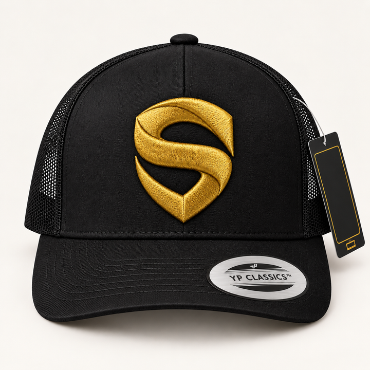 ✨🖤 Gold Shield – Stitched Shield · Gold 3D puff · Black Curved Trucker | Hand Finished in Dubai | EmbroMania