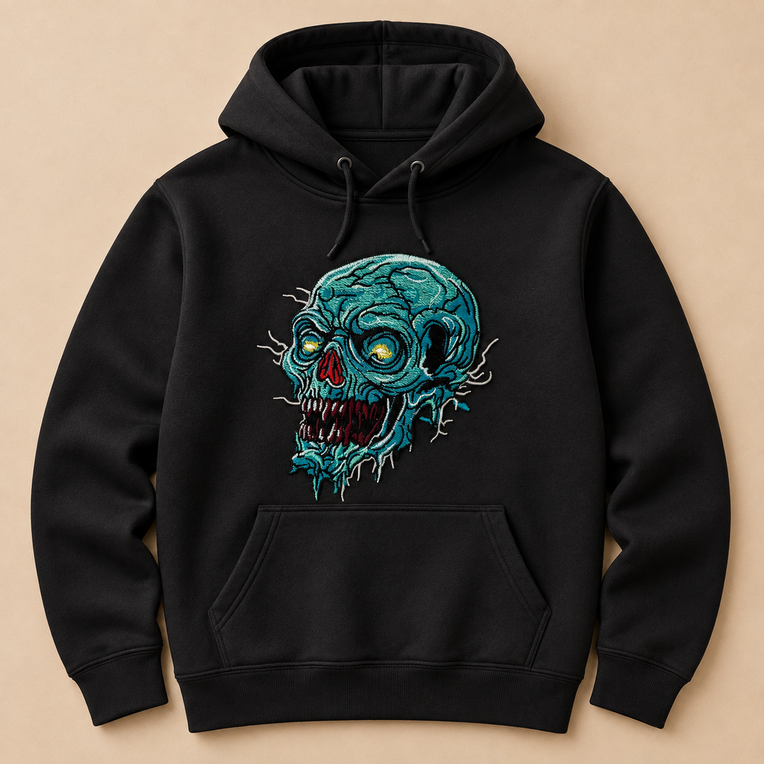 Swamp Wraith Skull Machine Embroidered Hoodie in Medium White – Rotting teal skull design with dripping tendrils embroidered on white 320gsm premium fleece | Hand Finished in Dubai