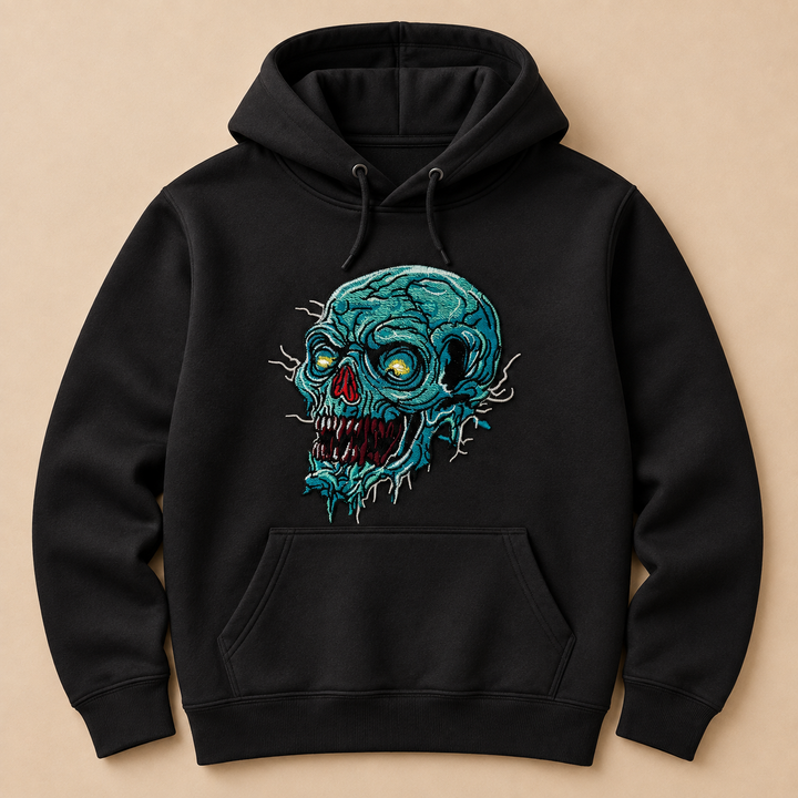 Swamp Wraith Skull Machine Embroidered Hoodie in Medium White – Rotting teal skull design with dripping tendrils embroidered on white 320gsm premium fleece | Hand Finished in Dubai