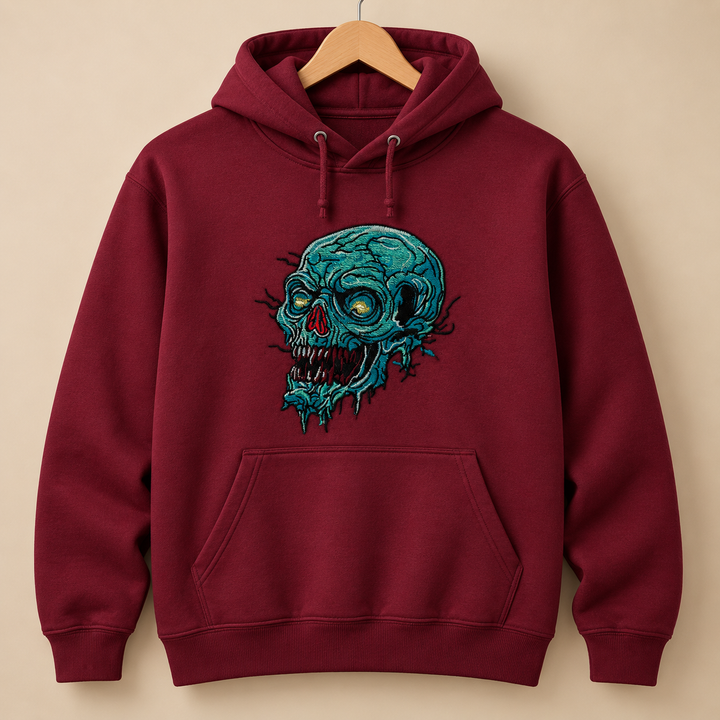 Swamp Wraith Skull Machine Embroidered Hoodie in Small Burgundy – Rotting teal skull design with dripping tendrils embroidered on burgundy 320gsm premium fleece | Hand Finished in Dubai