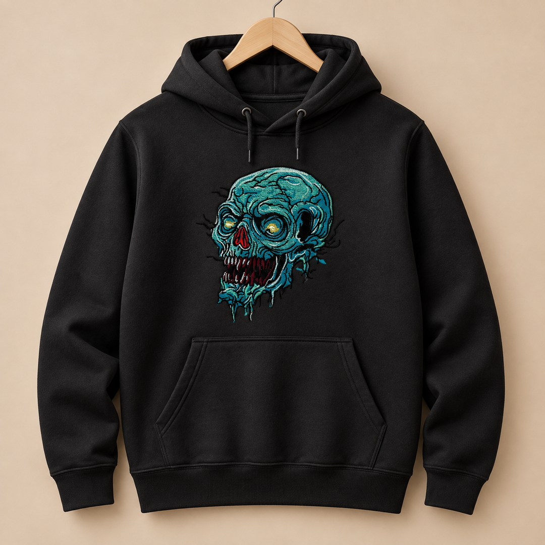 Swamp Wraith Skull Machine Embroidered Hoodie in Small White – Rotting teal skull design with dripping tendrils embroidered on white 320gsm premium fleece | Hand Finished in Dubai