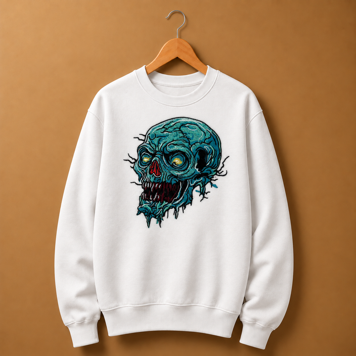 Swamp Wraith Skull Machine Embroidered Sweatshirt in Medium Mint Green – Rotting teal skull design embroidered on mint green 320gsm cotton fleece crewneck | Hand Finished in Dubai