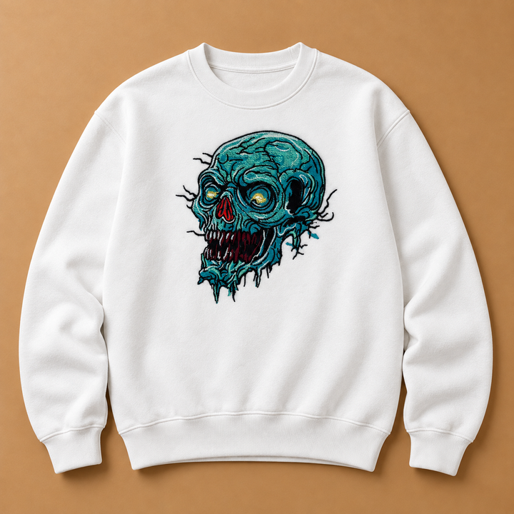Swamp Wraith Skull Machine Embroidered Sweatshirt in Small Mint Green – Rotting teal skull design embroidered on mint green 320gsm cotton fleece crewneck | Hand Finished in Dubai