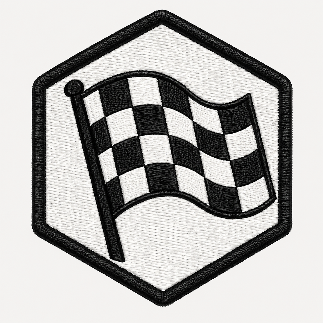 Turbo Flag embroidery patch featuring a checkered flag folded into a wind-blown shape in flat black and white | Hand Finished in Dubai | EmbroMania