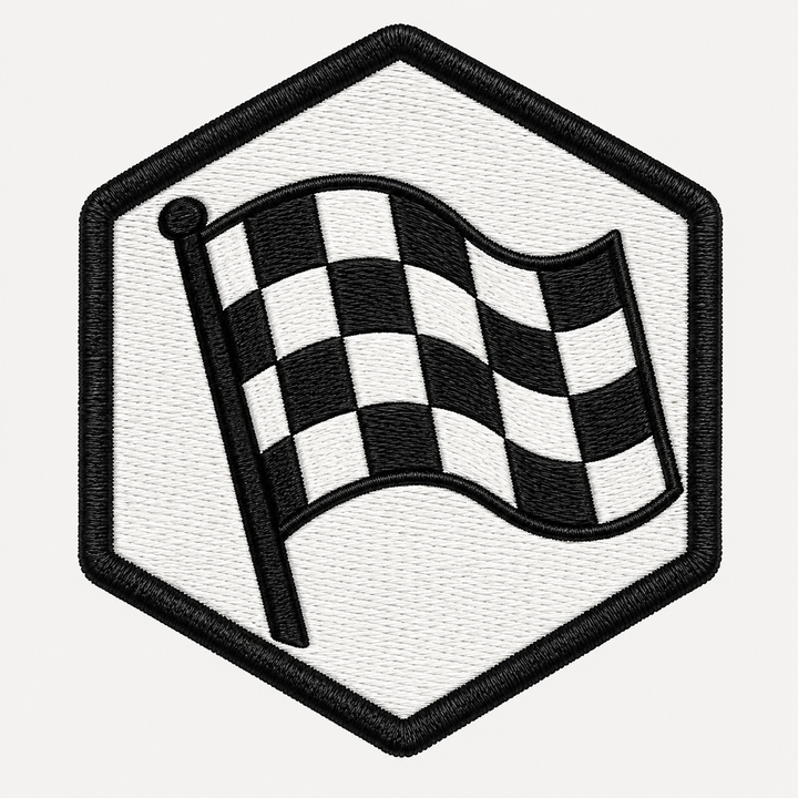 Turbo Flag embroidery patch featuring a checkered flag folded into a wind-blown shape in flat black and white | Hand Finished in Dubai | EmbroMania
