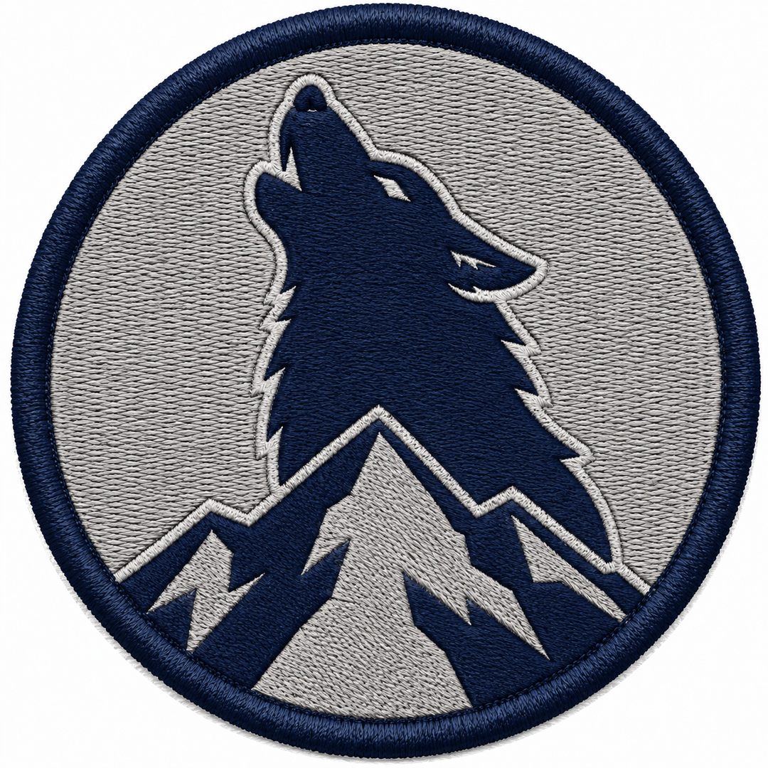 Wolf Howl Summit embroidery patch featuring a wolf head silhouette howling atop a mountain peak in flat navy and grey | Hand Finished in Dubai | EmbroMania